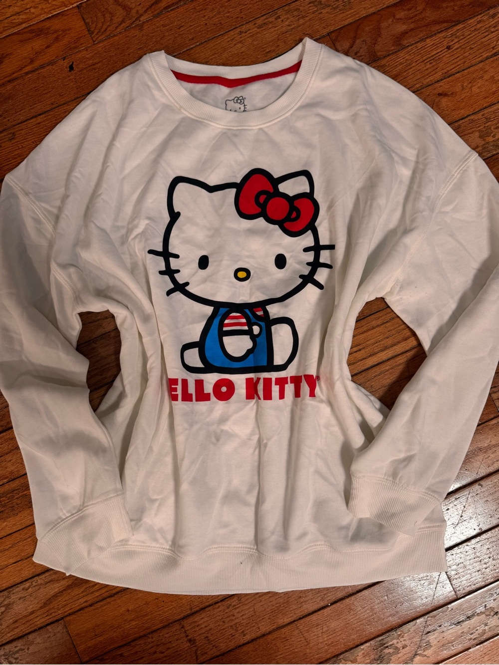 Hello Kitty White Women’sGraphic Sweatshirt with Red Bow